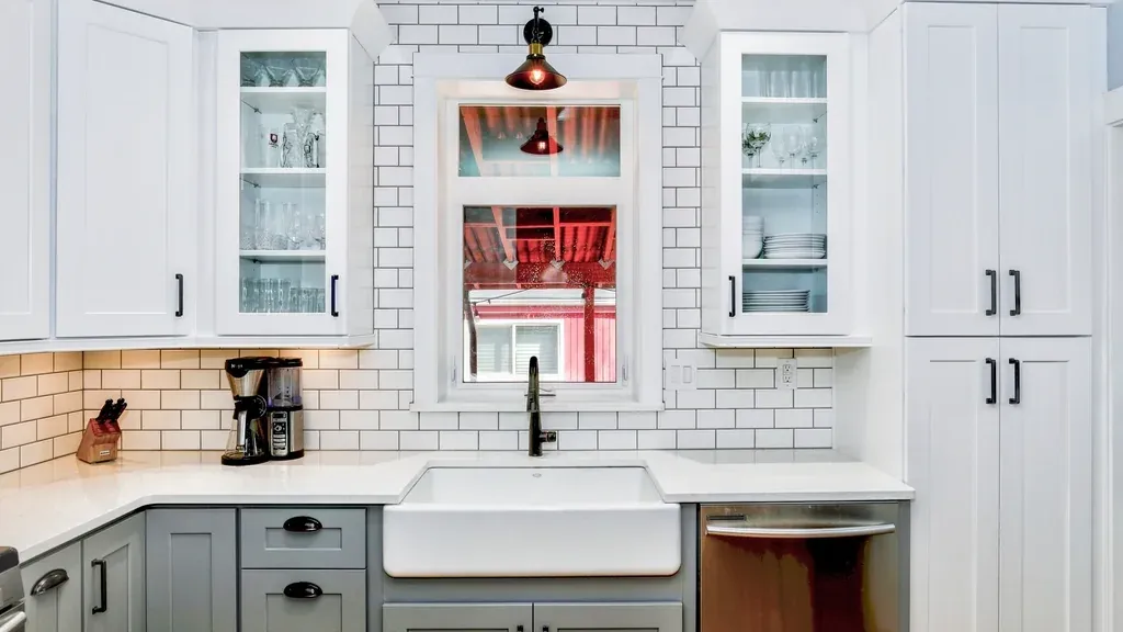 Farmhouse kitchen with an apron-front sink and white subway tile backsplash