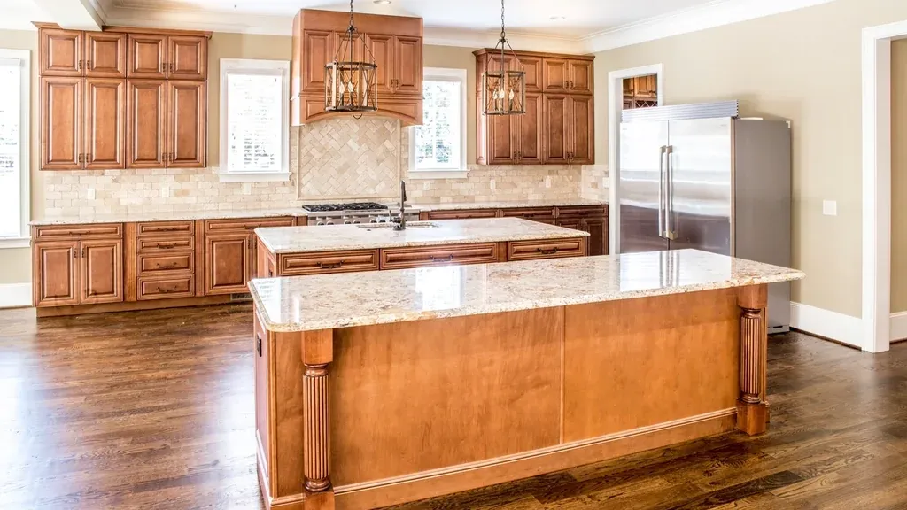 Classic solid-wood kitchen with a large island and granite countertop
